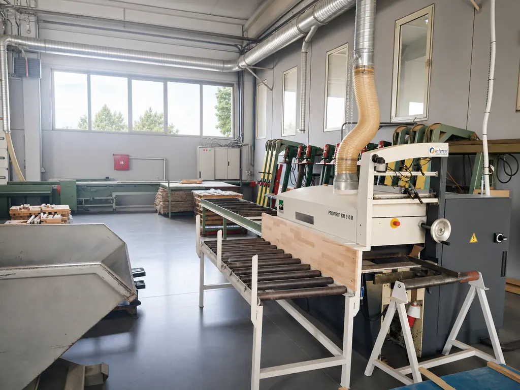 Bright, professionally lit Pašinac panel-processing line