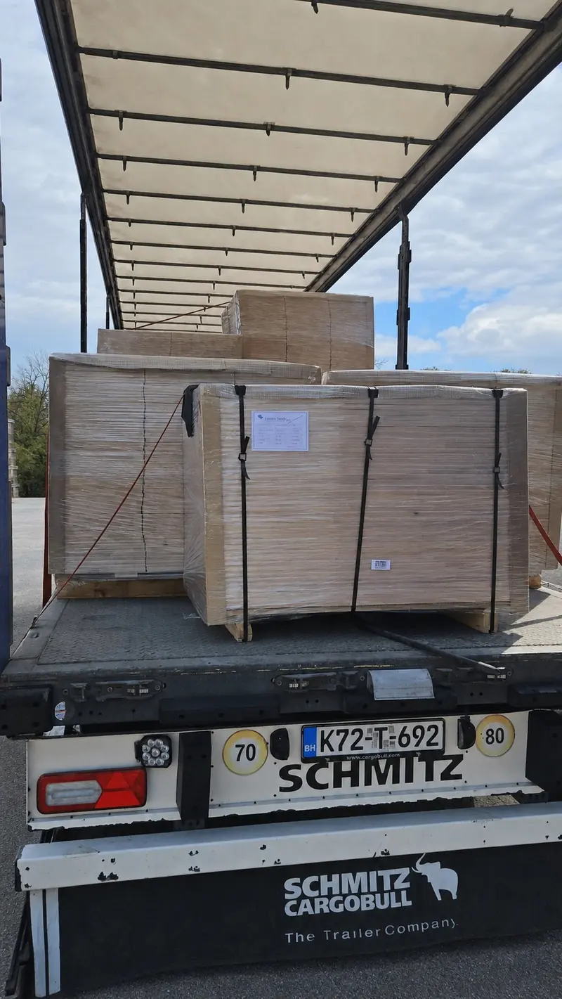 Palletised and labelled panel packs loaded on a trailer for shipment